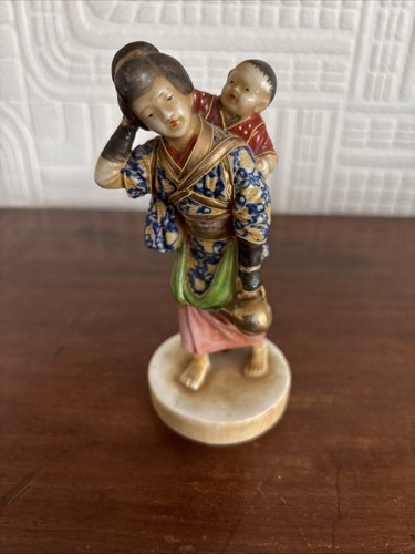Bellissima antica statuina