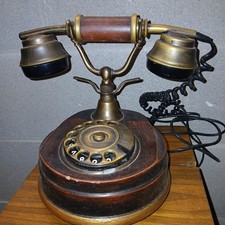 TELEFONO IN LEGNO A ROTELLA-