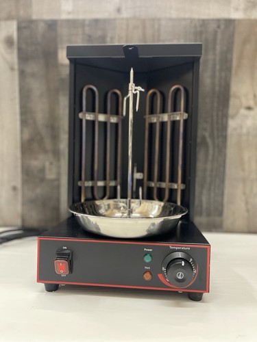 Barbecue giroscopico verticale