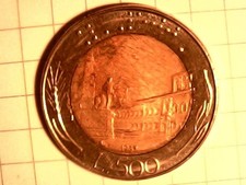 3 Monete: da 500 lire del 1987 + 0,50 euro Portogallo 2002 + 2 euro Grecia 1999