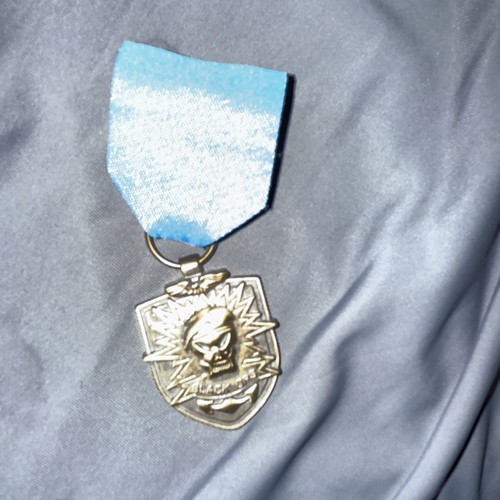 Distintivo medaglia teschio