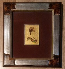 Quadro profilo donna su foglia