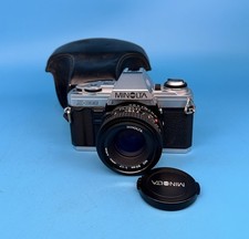 Minolta X-300 fotocamera reflex pellicola 35mm con obiettivo 50mm F/1.7 - testata e funzionante