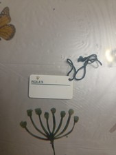 Authentic Rolex White Tag