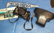 YASHICA  FX- D QUARZ  + OTTICHE + ACCESSORI