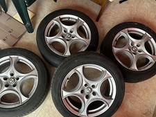 Cerchi in lega gommati 90% Alfa Romeo R17 buono stato.
