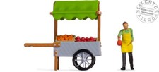 Noch 16501 personaggi: fruttivendolo a lavoro con bancarella su ruote in scala 1