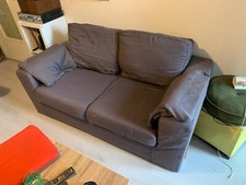 Divano due posti sfoderabile con copertura grigia