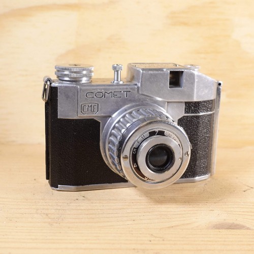 Macchina fotografica - , a