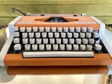 Vintage "tiger orange" Olympia