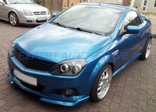 COPPIA FARI LENTICOLARI NERI (NO DAYLINE) OPEL TIGRA B TWINTOP DAL 2004 -- 2009