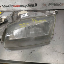 811502B611 Proiettore SX TOYOTA CARINA E 2.0 GLi (98Kw) Ber. 5p/b/1998cc