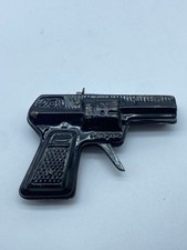 Pistola giocattolo in latta a