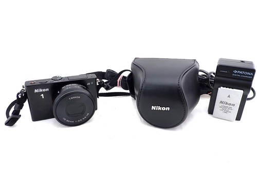 Nikon con 30 - j4,