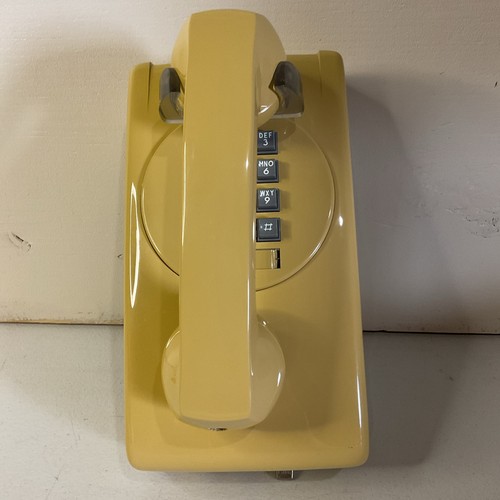 Telefono parete giallo - parete,