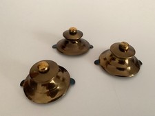 Cappucci vintage in metallo