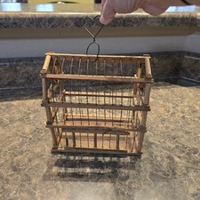 Bastoncini di legno e gabbia