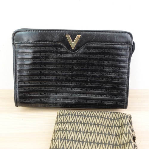 Pochette vintage pelle - in,