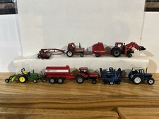 Trattori e attrezzi vari 1/64