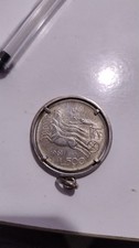una moneta d'argento da 500li con biga e cavalli 1961 -1961