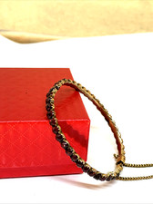 ANTICO BRACCIALE VITTORIANO CON GRANATI BOHO MONTATI A GRIFF TOMBACCO E ORO 9K