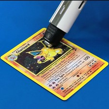 Penna termica lisciante per trattare grinze/pieghe carte Pokemon Yugioh Magic ?