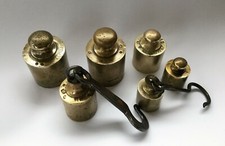 Pesi antichi in ottone