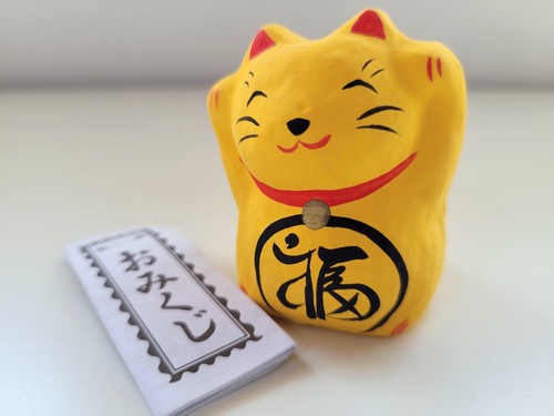 Maneki neko gatto portafortuna