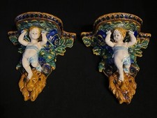 Coppia mensole da parete vintage in maiolica putti cherubino - ceramica testa di leone