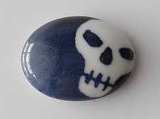 Teschio e ossa incrociate