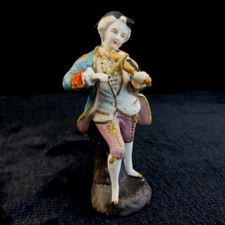 Antique Porcelain Figurine