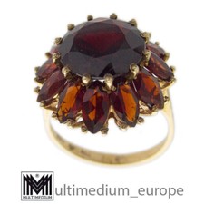 Anello oro 333 granato