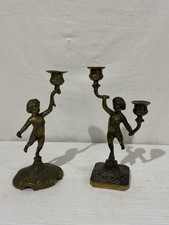 Coppia di candelieri in ottone con putto epoca '900 -porta candela candelabri