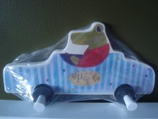 Ganci da parete in legno per