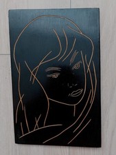 Quadro in legno intagliato da