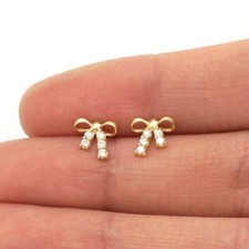 Orecchini a perno in oro giallo e bianco 14 kt con fiocco tondo e fibbia a vite