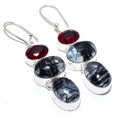 Quarzo rutilato nero, granato