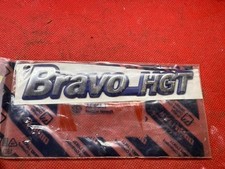 EMBLEMA SIGLA MODELLO FIAT BRAVO HGT 95-01 7791332 NUOVO ORIGINALE SCRITTA