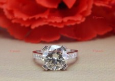 Round Moissanite Solitaire