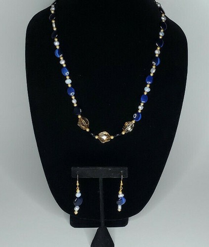 Collana orecchini con - e,