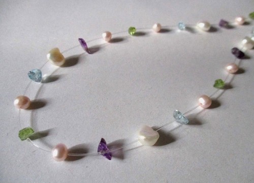 Collana filo nylon con - filo,