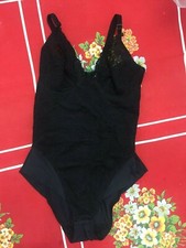 body nero sgambato con pizzo