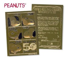 SNOOPY PEANUTS 23K carta oro