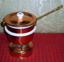 SET FONDUTA IN RAME, PORCELLANA E OTTONE. 