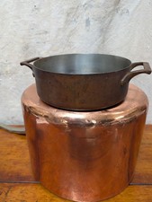 Antica pentola in rame con