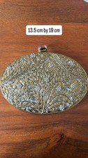 Pochette elegante oro