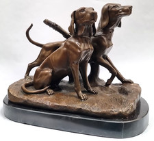 Statua in bronzo due cani da