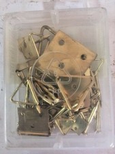 13 Attaccaglie snodate asole assortite  oro ganci quadri cornici muro gancio 