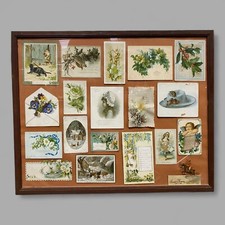 Quadro con cartoline augurali