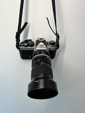 Nikon FE2 Silver + Obiettivo Nikon 28-85 + Parasole Nikon HN-24